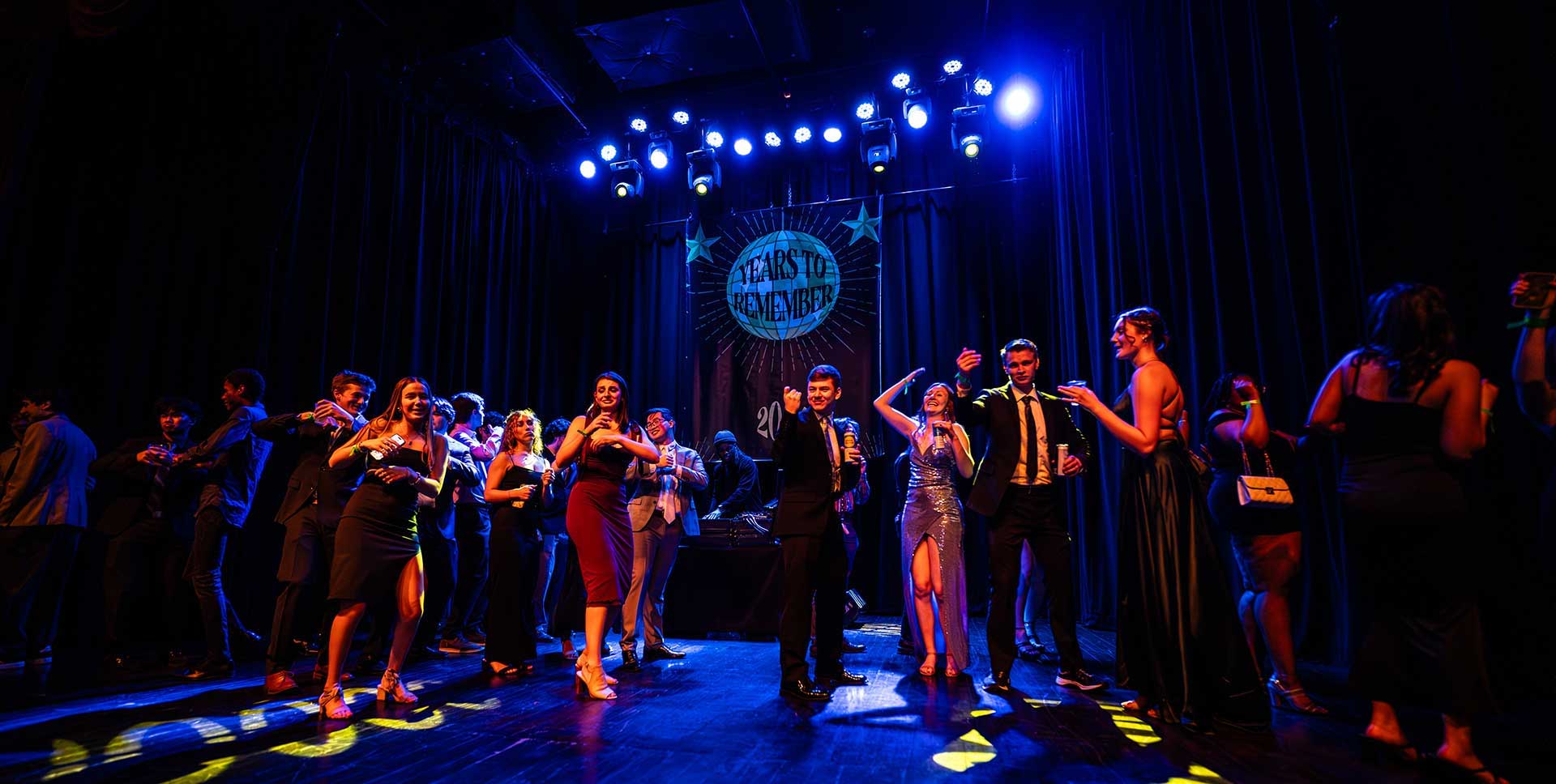 Students dancing during IWU Senior Prom at the Castle Theater