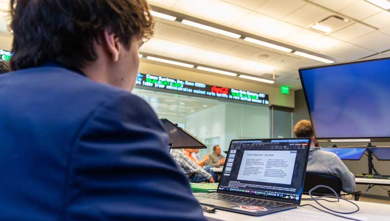 Student looking at screen during presentation in Bloomberg Lab