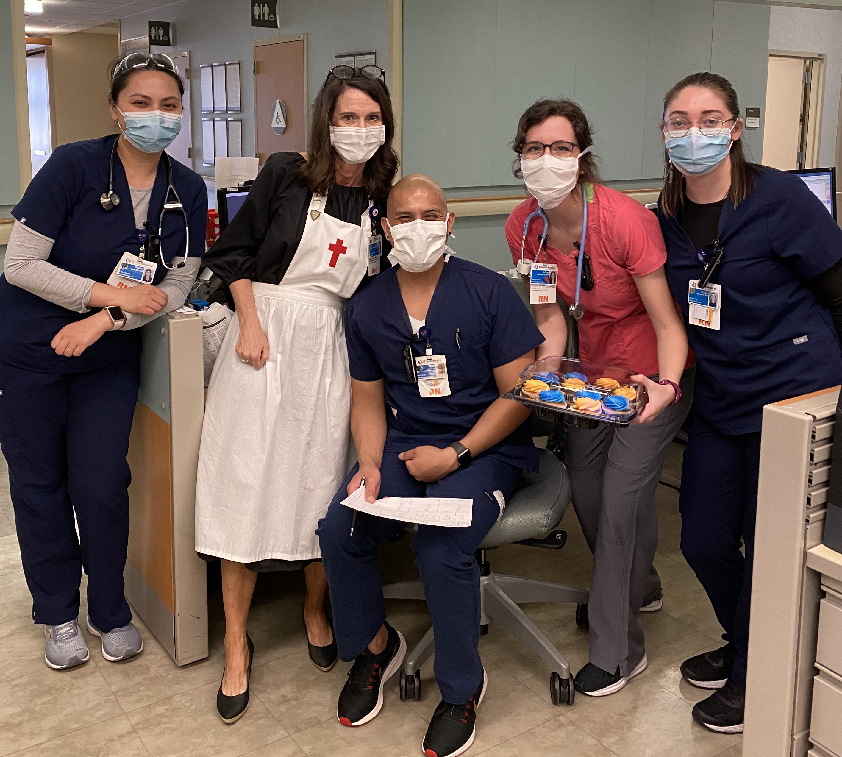 Reinking (second from left) celebrates the 200th anniversary of Florence Nightingale’s birth with nurses at El Camino Health.