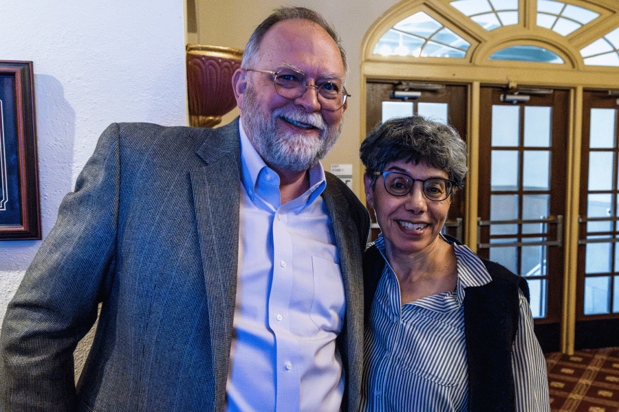 Curtis Trout and Zahia Drici pose in the lobby of Presser Hall