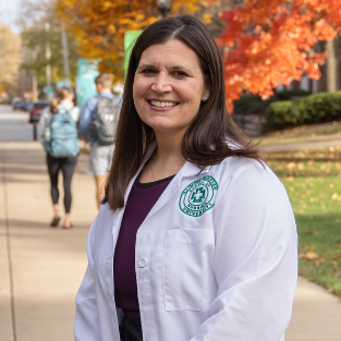 Amber Kujath in nursing jacket