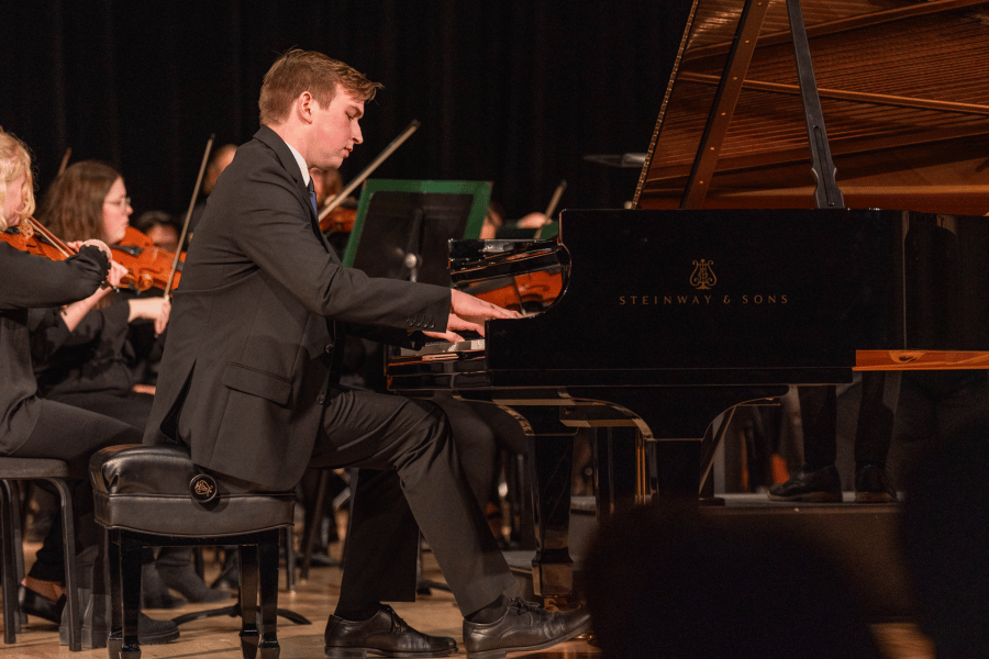 Ben Wells '27 performing Piano at Westbrook Auditorium