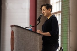 Hannah Mesouani, interim Director of the Office of Diversity and Inclusion, introduces Professor Sundiata Cha-Jua.