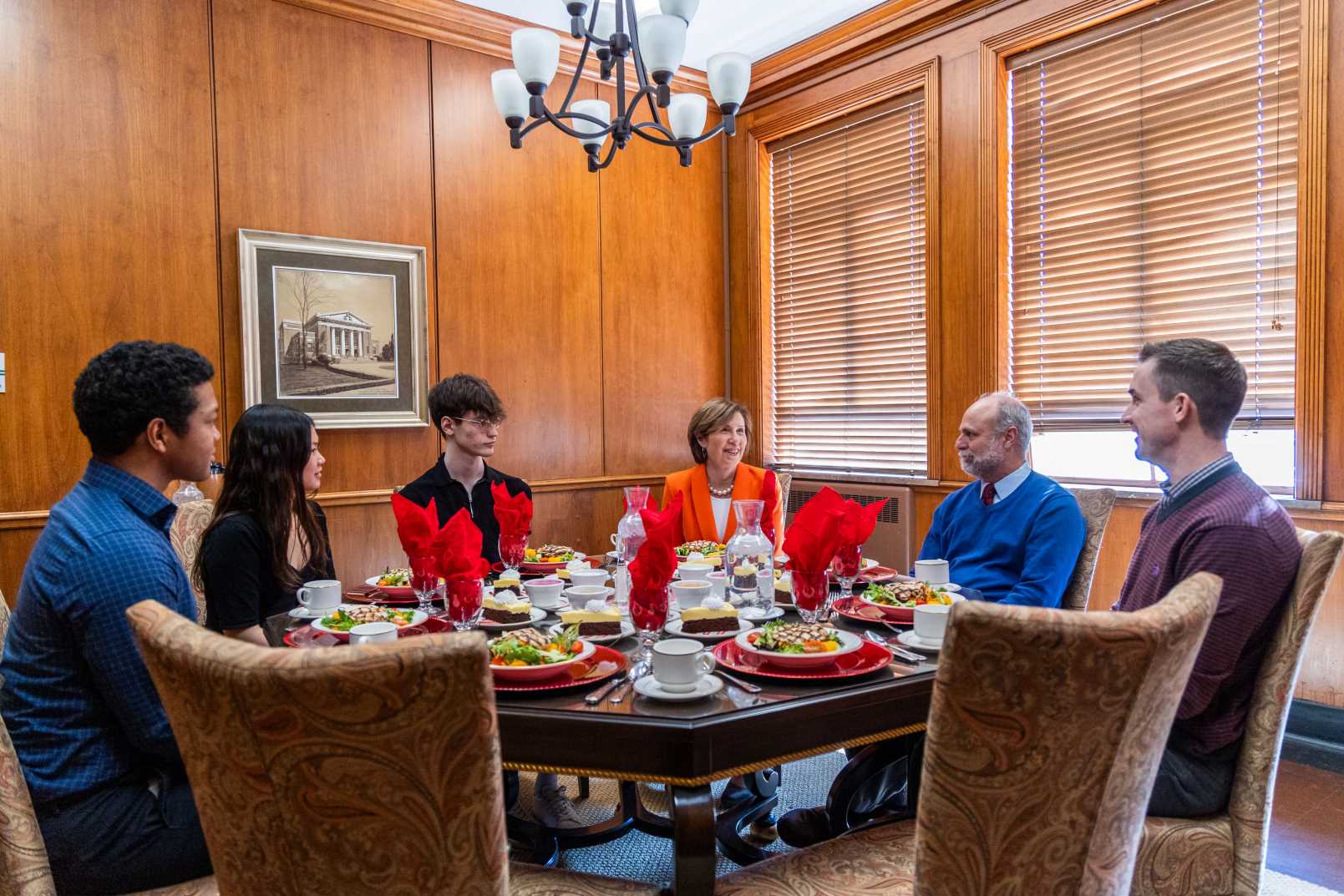 Students having lunch with Justice Rochford